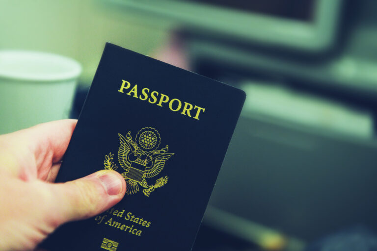united states of america passport in a hand